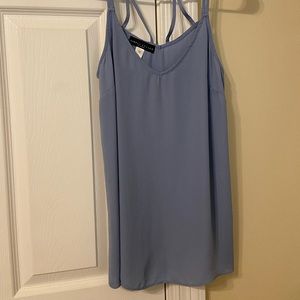 blue tank top with criss cross on back